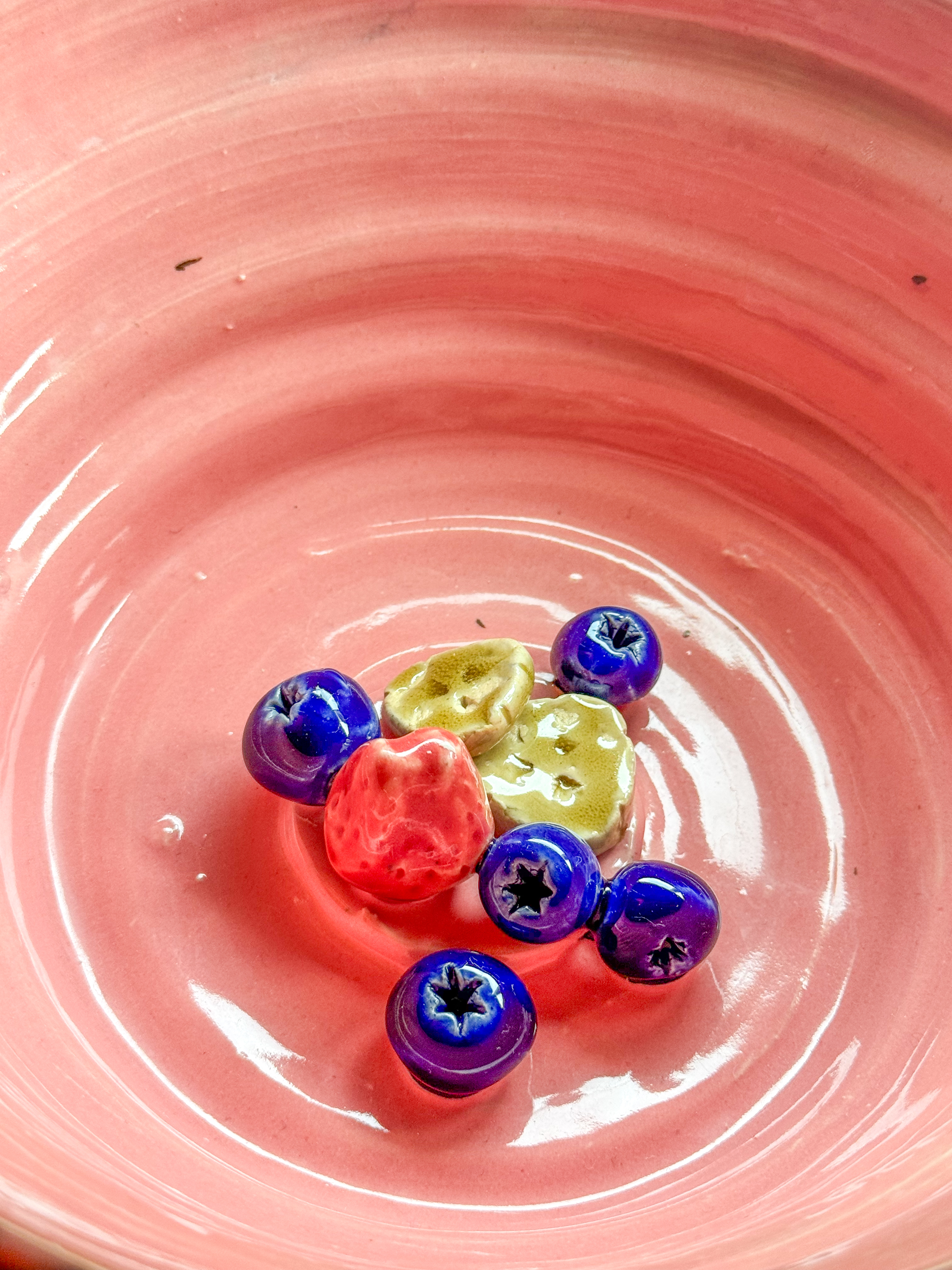 Tiny fruits in bowl
